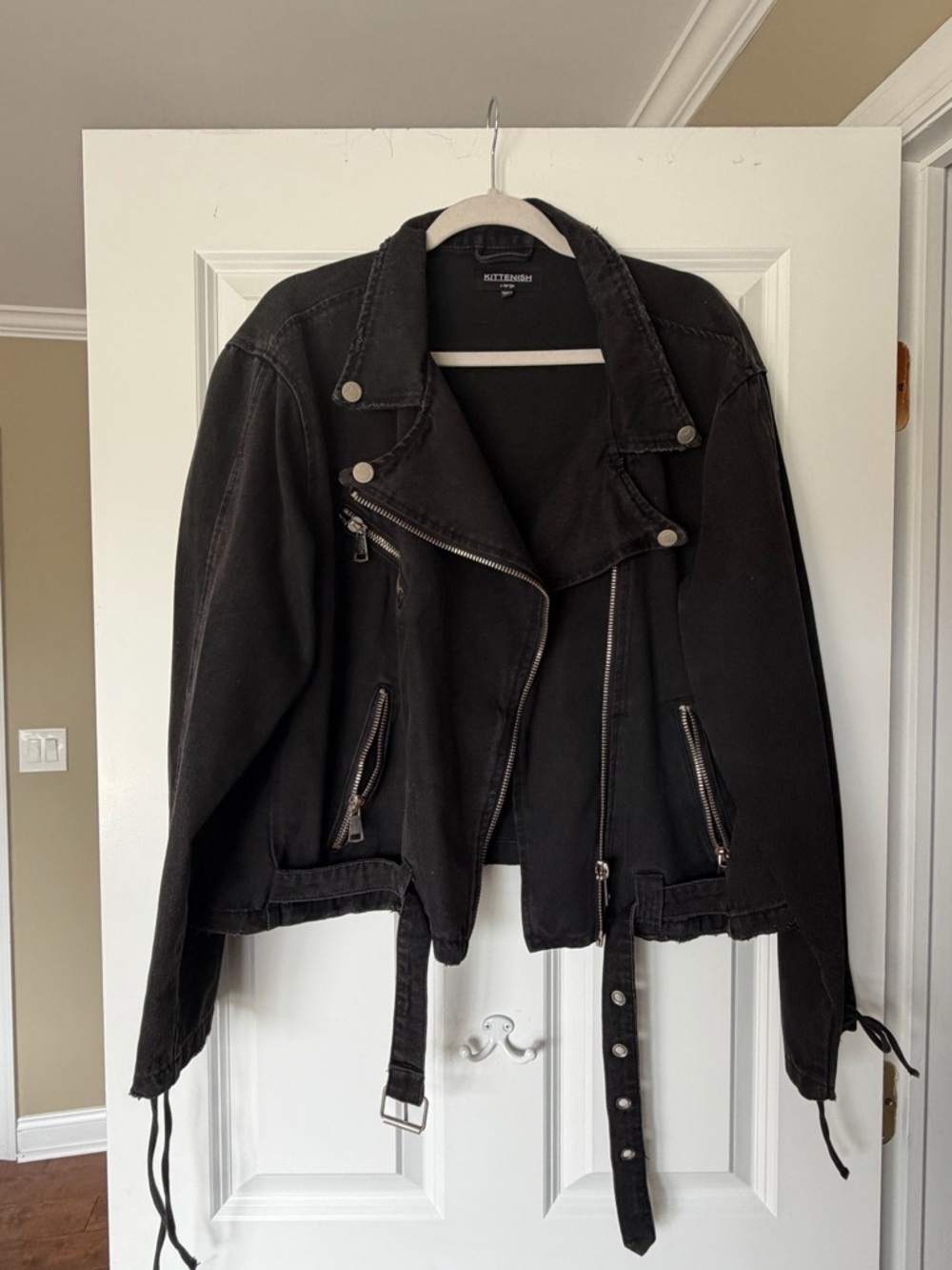 Kittenish Black Moto-Style Jacket with Zipper Details